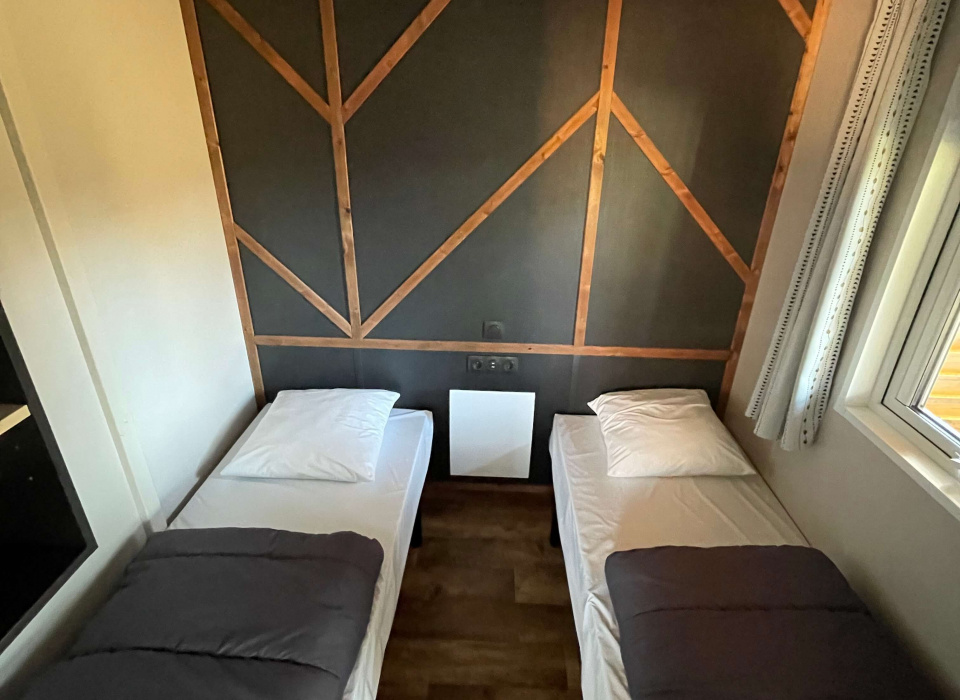 CHALET  SESAME 3 CHAMBRES CHAMBRE ENFANT 3 ET 4 AU CAMPING DU GRAND FAY